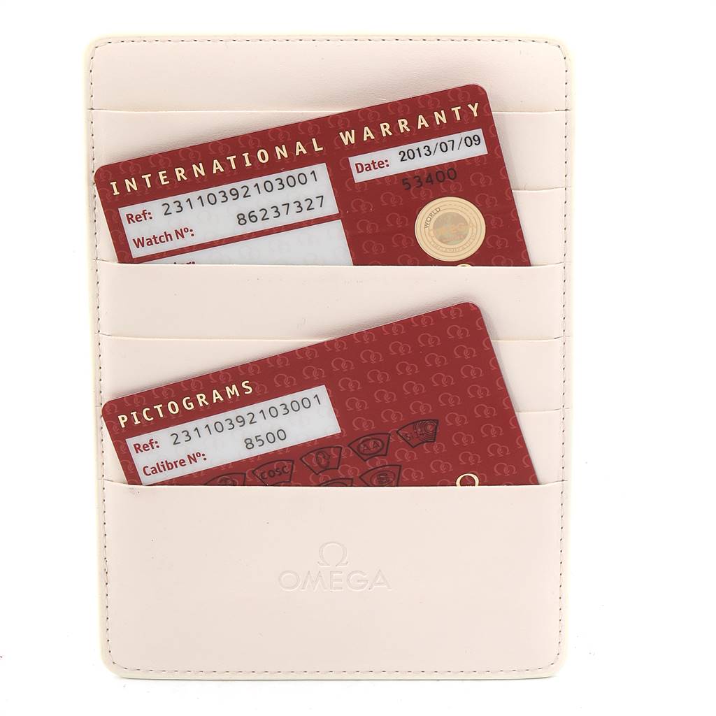 The image shows the warranty and pictogram cards for the Omega Aqua Terra 231.10.39.21.03.001 Men's Stainless Steel Blue Dial 231.10.39.21.03.001 Men's Stainless Steel Blue Dial model, held in an Omega-branded cardholder.