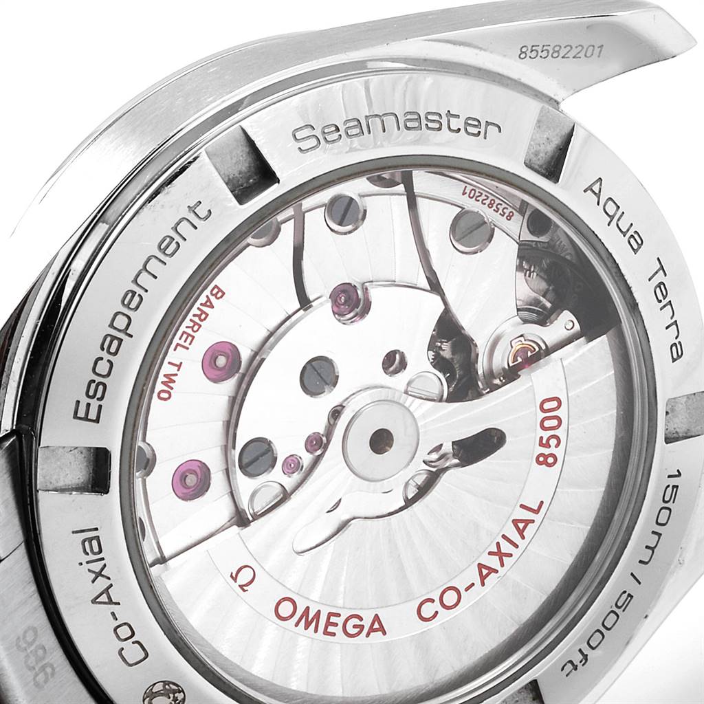 The image shows the back view of the Omega Aqua Terra 231.10.39.21.02.001 Men
s Stainless Steel Silver Dial 231.10.39.21.02.001 Men
s Stainless Steel Silver Dial watch, revealing its internal mechanism and inscriptions.