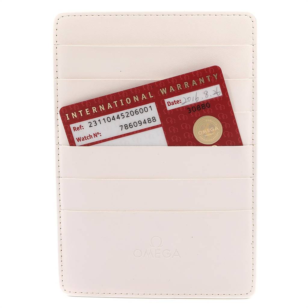 The image shows an Omega Aqua Terra 231.10.44.52.06.001 Men's Stainless Steel Grey Dial 231.10.44.52.06.001 Men's Stainless Steel Grey Dial model international warranty card partially inserted into a white cardholder.