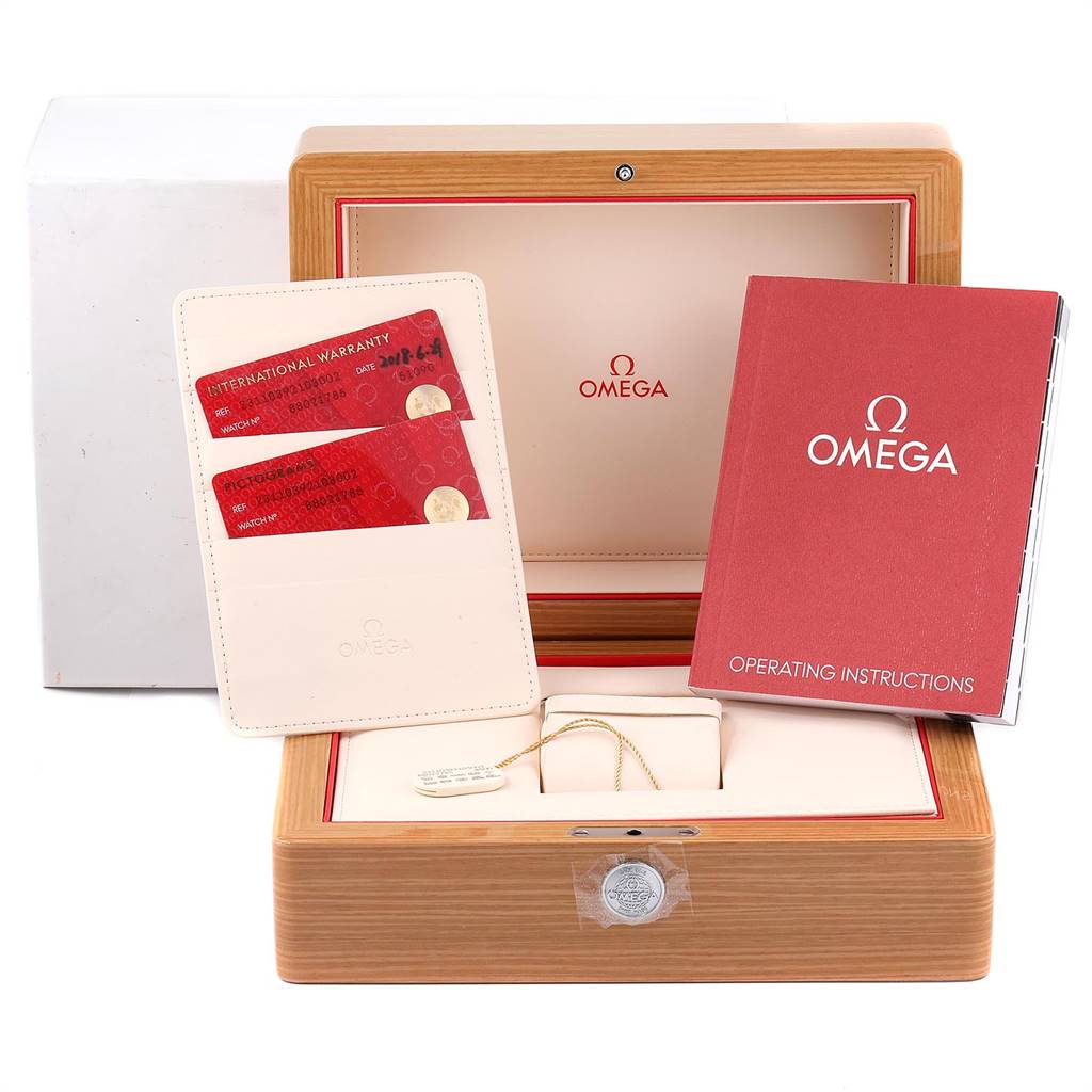 This image shows the packaging, warranty cards, and instruction manual for the Omega Aqua Terra 231.10.39.21.03.002 Men
s Stainless Steel Blue Dial 231.10.39.21.03.002 Men
s Stainless Steel Blue Dial watch model.