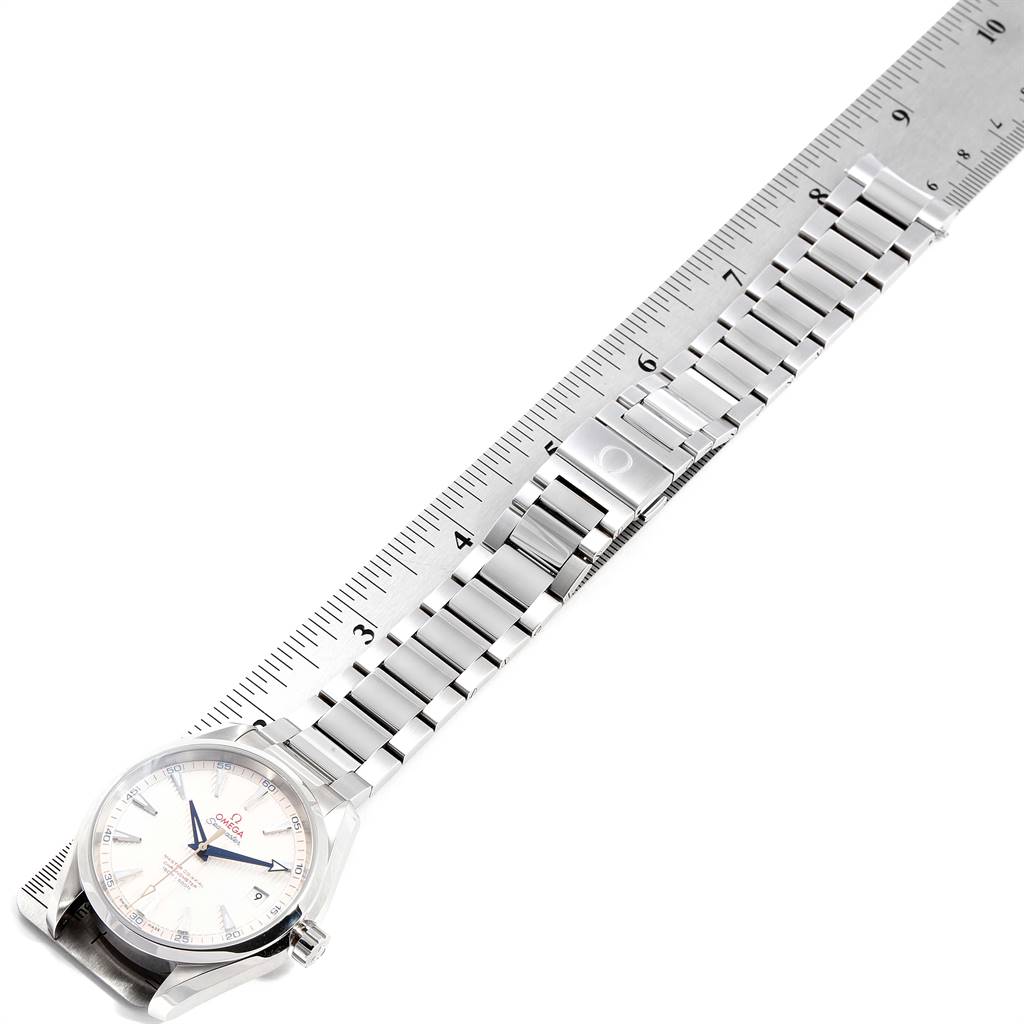 The Omega Aqua Terra 231.10.42.21.02.004 Men
s Stainless Steel Silver Dial 231.10.42.21.02.004 Men
s Stainless Steel Silver Dial watch is shown from an oblique angle, displaying its face, bracelet, and clasp alongside a ruler.