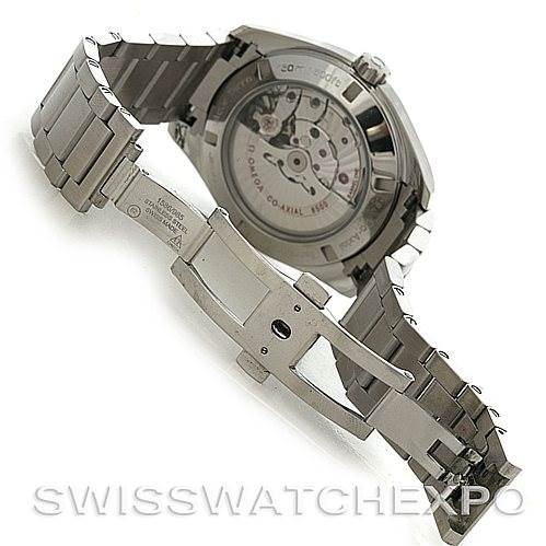 The image shows the back and open bracelet of the Omega Aqua Terra 231.10.42.21.06.001 Men's Stainless Steel Grey Dial 231.10.42.21.06.001 Men's Stainless Steel Grey Dial watch, highlighting its transparent case back and clasp.