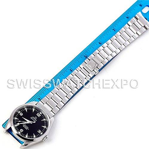 The image shows an Omega Aqua Terra 2502.52.00 Men
s Stainless Steel Black Dial 2502.52.00 Men
s Stainless Steel Black Dial watch laid flat next to a blue ruler, highlighting its stainless steel bracelet and face.