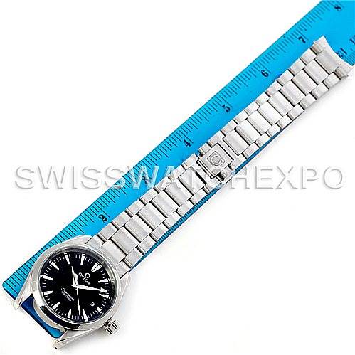 The image shows an Omega Aqua Terra 2518.50.00 Men's Stainless Steel Black Dial 2518.50.00 Men's Stainless Steel Black Dial watch laid flat next to a blue ruler, displaying the watch face, bracelet, and clasp.