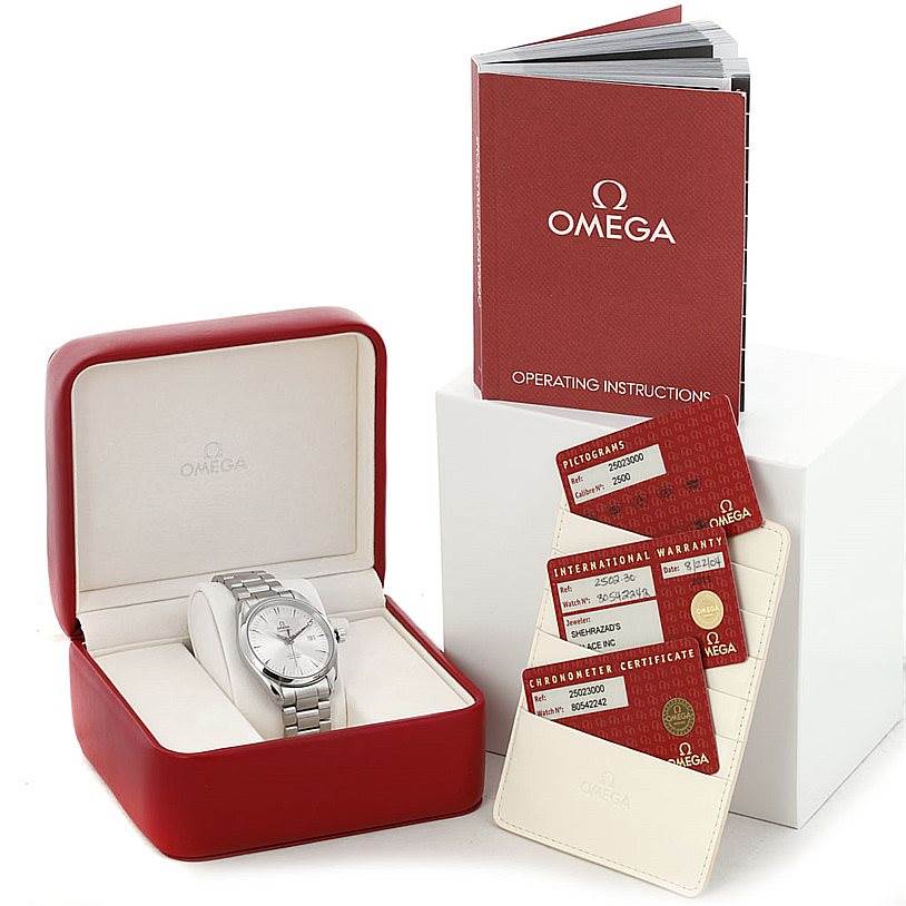 The image shows the Omega Aqua Terra 2502.30.00 Men's Stainless Steel Silver Dial 2502.30.00 Men's Stainless Steel Silver Dial watch at a slightly elevated angle in its box, alongside operating instructions and warranty cards.