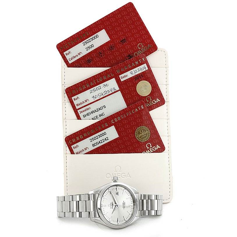The Omega Aqua Terra 2502.30.00 Men's Stainless Steel Silver Dial 2502.30.00 Men's Stainless Steel Silver Dial watch is shown lying flat with warranty cards and a certificate holder above it.
