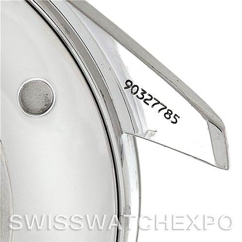 This image shows a close-up of the case back and lug of an Omega Aqua Terra 2517.50.00 Men's Stainless Steel Black Dial 2517.50.00 Men's Stainless Steel Black Dial watch, revealing the serial number.