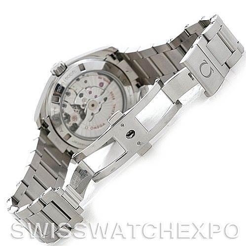 The image shows the back view and bracelet of an Omega Aqua Terra 231.10.39.21.02.001 Men
s Stainless Steel Silver Dial 231.10.39.21.02.001 Men
s Stainless Steel Silver Dial model, featuring its open mechanical movement and clasp.