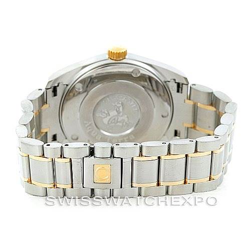 The image shows the back case and clasp of an Omega Aqua Terra 2317.30.00 Men
s Stainless Steel Silver Dial 2317.30.00 Men
s Stainless Steel Silver Dial watch, highlighting its stainless steel and gold bracelet.