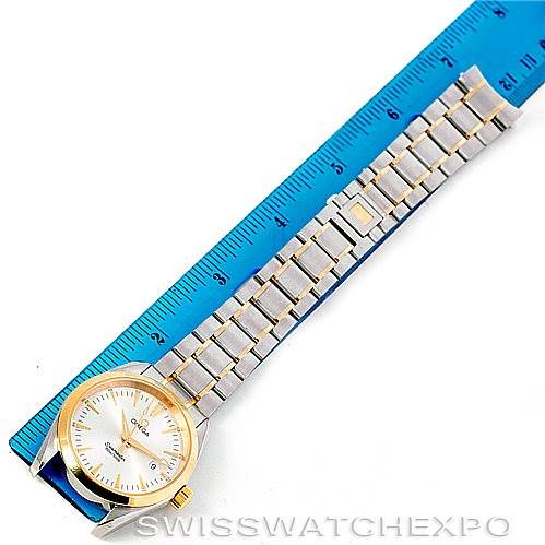 This image shows an Omega Aqua Terra 2317.30.00 Men
s Stainless Steel Silver Dial 2317.30.00 Men
s Stainless Steel Silver Dial watch laid flat with a blue ruler measuring its length.