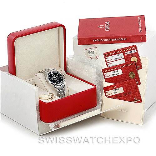The image shows the Omega Aqua Terra 2512.52.00 Men
s Stainless Steel Black Dial 2512.52.00 Men
s Stainless Steel Black Dial watch with its box, operating instructions, and certification cards.