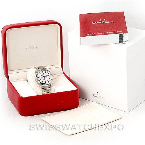 The image shows an Omega Aqua Terra 2512.30.00 Men
s Stainless Steel Silver Dial 2512.30.00 Men
s Stainless Steel Silver Dial watch in its red box, accompanied by an instruction manual and additional packaging.
