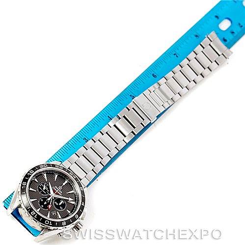 The image shows an Omega Aqua Terra 231.10.44.52.06.001 Men
s Stainless Steel Grey Dial 231.10.44.52.06.001 Men
s Stainless Steel Grey Dial watch with a metal bracelet laid next to a blue ruler, taken from a top-down angle.