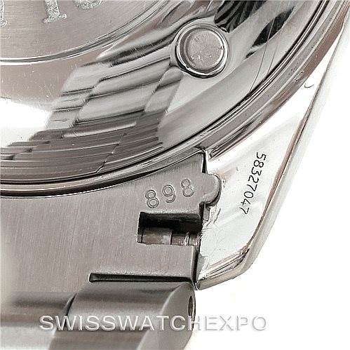 This close-up image shows the Omega Aqua Terra 2517.80.00 Men
s Stainless Steel Blue Dial 2517.80.00 Men
s Stainless Steel Blue Dial model
s stainless steel bracelet and case back, focusing on the serial number and end link.