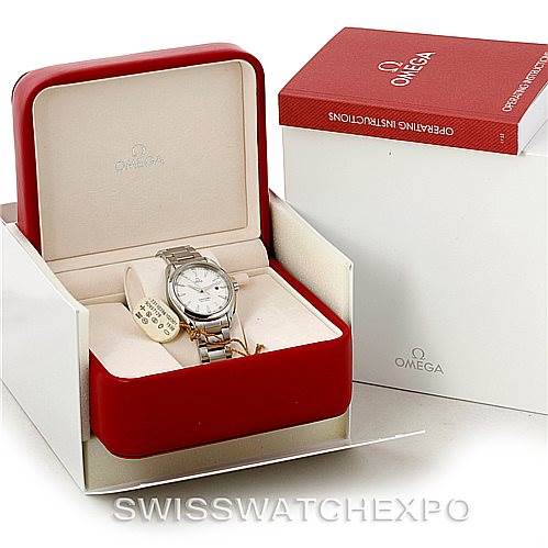 The image shows an Omega Aqua Terra 231.10.39.61.02.001 Men's Stainless Steel Silver Dial 231.10.39.61.02.001 Men's Stainless Steel Silver Dial watch in a red box, along with operating instructions and outer packaging.