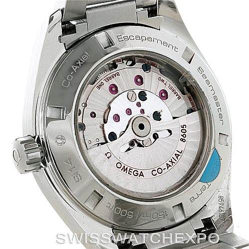 The image shows the back view of an Omega Aqua Terra 231.10.43.22.01.001 Men
s Stainless Steel Black Dial 231.10.43.22.01.001 Men
s Stainless Steel Black Dial watch, highlighting its Co-Axial escapement and movement components.