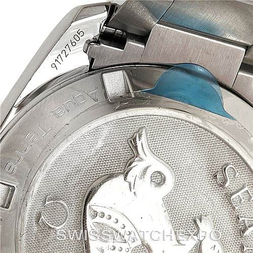 The image shows a close-up of the case back and part of the bracelet of an Omega Aqua Terra 231.10.39.61.06.001 Men
s Stainless Steel Silver Dial 231.10.39.61.06.001 Men
s Stainless Steel Silver Dial watch.