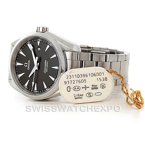 The image shows the Omega Aqua Terra 231.10.39.61.06.001 Men
s Stainless Steel Silver Dial 231.10.39.61.06.001 Men
s Stainless Steel Silver Dial watch face and part of the stainless steel bracelet, along with a serial tag.