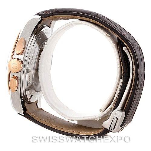 This Omega Aqua Terra 231.23.44.50.06.001 Men's Steel and Gold (two tone) Grey Dial 231.23.44.50.06.001 Men's Steel and Gold (two tone) Grey Dial watch is shown in a side view, highlighting the case, crown, pushers, and leather strap.