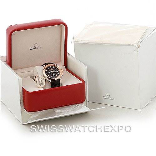 The image shows an Omega Aqua Terra 231.23.44.50.06.001 Men's Steel and Gold (two tone) Grey Dial 231.23.44.50.06.001 Men's Steel and Gold (two tone) Grey Dial model watch in an open red box with additional packaging visible.