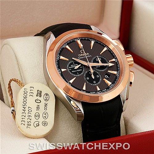 The image shows the Omega Aqua Terra 231.23.44.50.06.001 Men's Steel and Gold (two tone) Grey Dial 231.23.44.50.06.001 Men's Steel and Gold (two tone) Grey Dial watch angled from the front and side, highlighting its dial, bezel, and part of the strap.