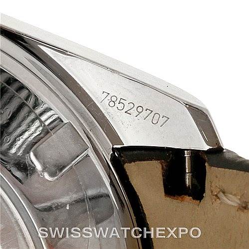 Close-up of the Omega Aqua Terra 231.23.44.50.06.001 Men's Steel and Gold (two tone) Grey Dial 231.23.44.50.06.001 Men's Steel and Gold (two tone) Grey Dial watch showing the casing, serial number, and part of the bezel.