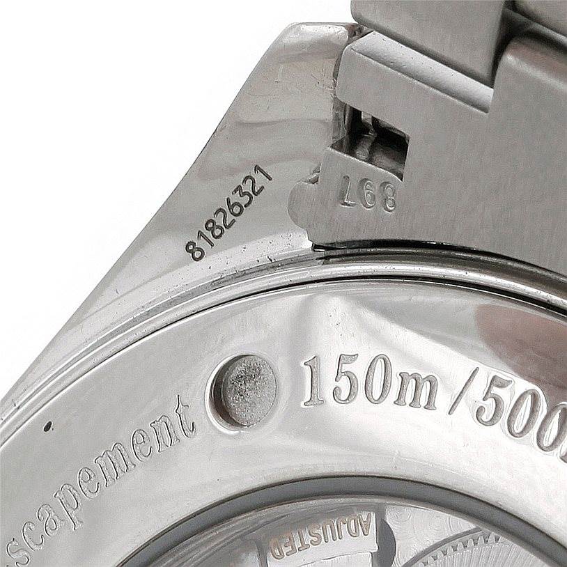 The image shows a close-up of the case back and part of the bracelet attachment of an Omega Aqua Terra 2502.34.00 Men
s Stainless Steel Silver Dial 2502.34.00 Men
s Stainless Steel Silver Dial watch.