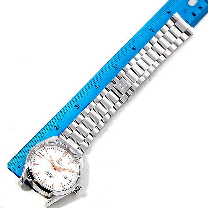 The image shows an Omega Aqua Terra 2502.34.00 Men
s Stainless Steel Silver Dial 2502.34.00 Men
s Stainless Steel Silver Dial watch from a top-down angle with its case, dial, and stainless steel bracelet visible.