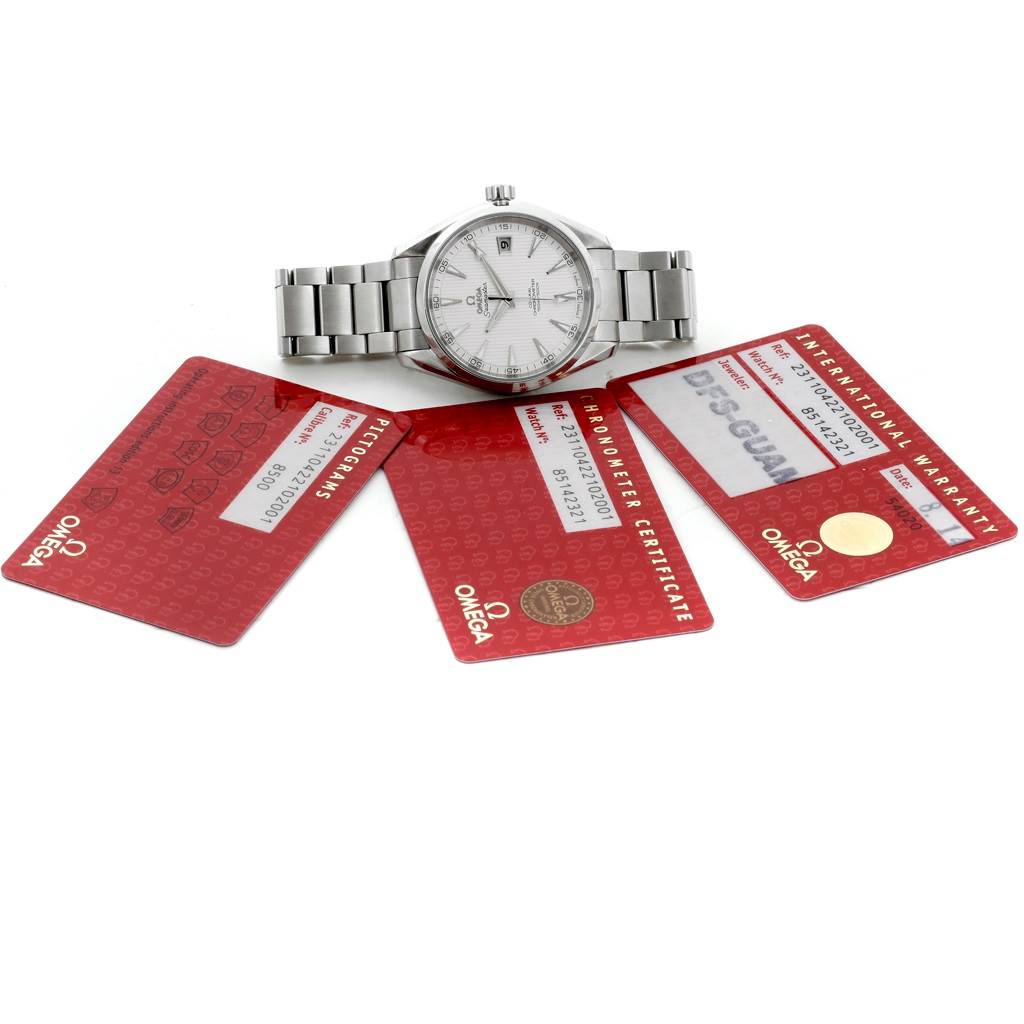 The image shows an Omega Aqua Terra 231.10.42.21.02.001 Men
s Stainless Steel Silver Dial 231.10.42.21.02.001 Men
s Stainless Steel Silver Dial watch placed above three accompanying red cards, viewed from the top angle.