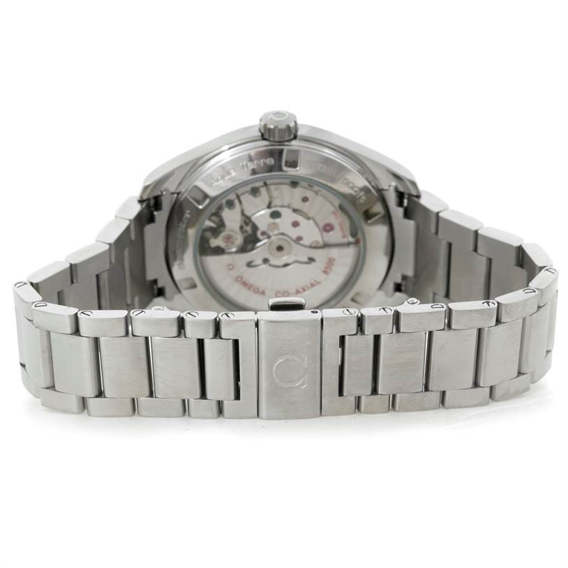 The Omega Aqua Terra 231.10.42.21.06.001 Men
s Stainless Steel Grey Dial 231.10.42.21.06.001 Men
s Stainless Steel Grey Dial watch is shown from the back, highlighting its see-through case back and stainless steel bracelet.