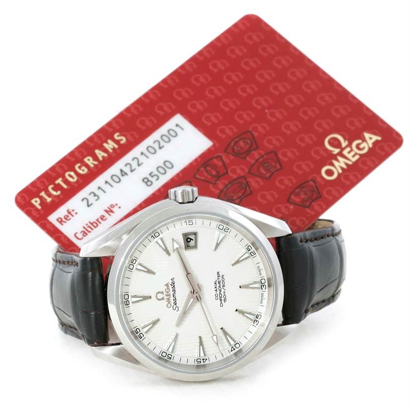 The image shows the face of an Omega Aqua Terra 231.10.42.21.02.001 Men
s Stainless Steel Silver Dial 231.10.42.21.02.001 Men
s Stainless Steel Silver Dial watch along with its red pictogram card. 