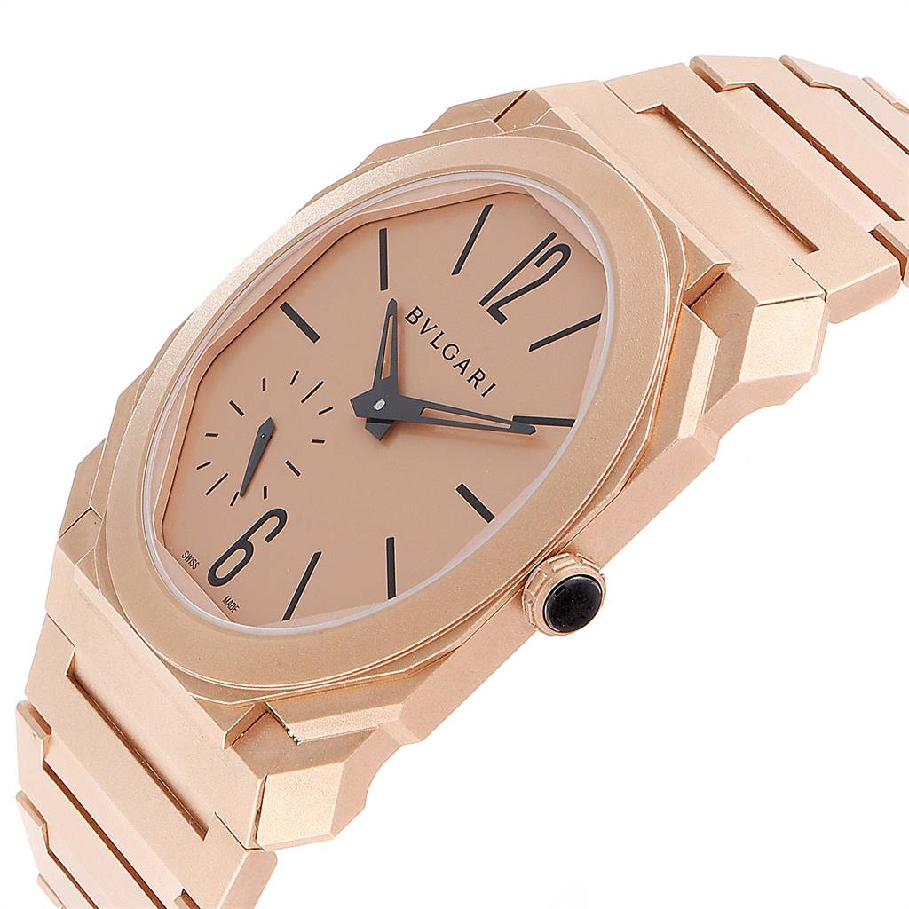 This image shows a rose gold Bvlgari Octo 102912 Men
s Rose Gold Pink Dial 102912 Men
s Rose Gold Pink Dial watch at an oblique angle, highlighting the dial, hands, crown, and partial bracelet.