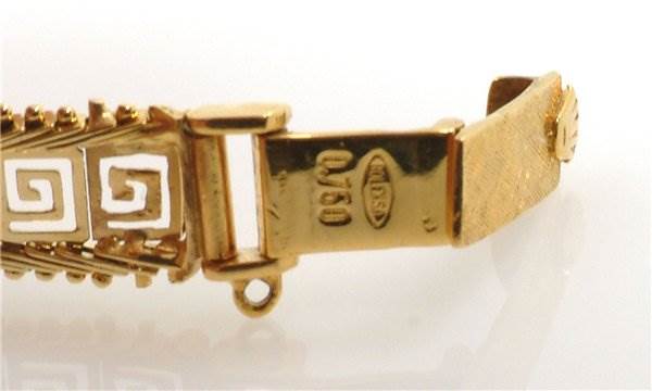 This image shows a close-up side view of the clasp and part of the bracelet of a Rolex Cocktail 2113 Women's Yellow Gold Silver Dial 2113 Women's Yellow Gold Silver Dial model watch.