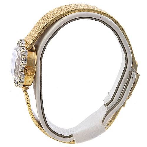 The image shows a side view of the Rolex Cocktail 8365 Women's Yellow Gold Champagne Dial 8365 Women's Yellow Gold Champagne Dial model, highlighting its case, crown, and part of the strap.