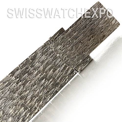 This image shows a close-up of the woven-bracelet detail of a Rolex Cocktail 2189 Women's White Gold Silver Dial 2189 Women's White Gold Silver Dial model watch.