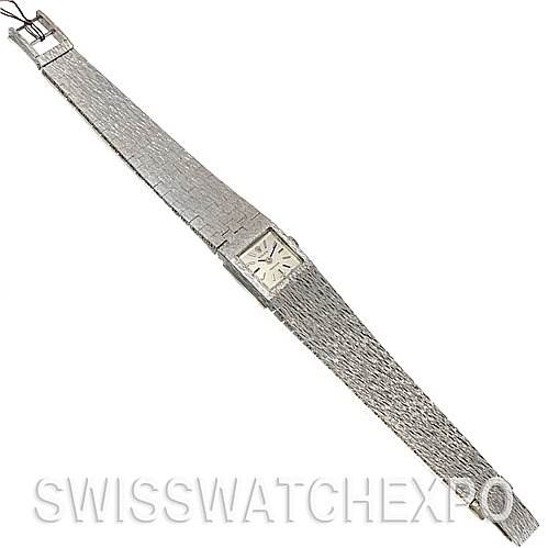 The image shows an overhead view of the Rolex Cocktail 2189 Women's White Gold Silver Dial 2189 Women's White Gold Silver Dial model watch, highlighting its face and metal bracelet.