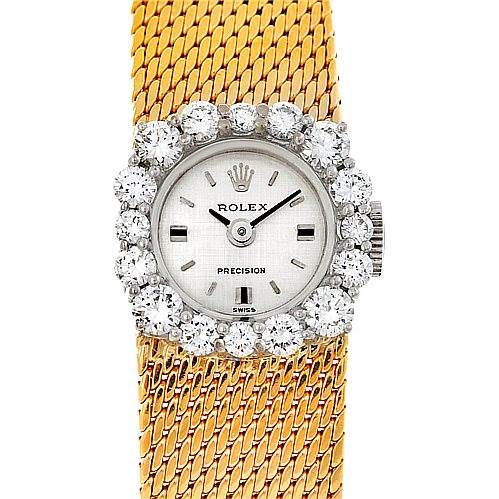 This image shows a top-down view of the Rolex Cocktail Women's Yellow Gold Silver Dial Women's Yellow Gold Silver Dial model, highlighting its face, bezel, and woven gold strap.