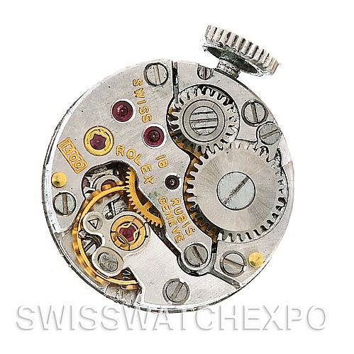 This image shows the internal mechanism and gears of the Rolex Cocktail Women's Yellow Gold Silver Dial Women's Yellow Gold Silver Dial model watch.