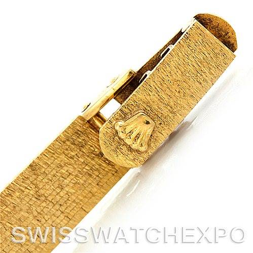 This image shows a close-up of the clasp and part of the bracelet of a Rolex Cocktail 4281 Women's Yellow Gold Champagne Dial 4281 Women's Yellow Gold Champagne Dial model watch.