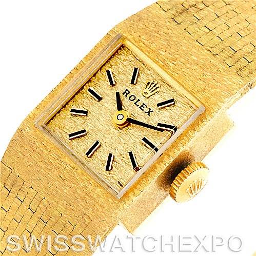 This image shows a close-up, top-down view of the Rolex Cocktail 4281 Women's Yellow Gold Champagne Dial 4281 Women's Yellow Gold Champagne Dial model watch, highlighting the watch face and crown.