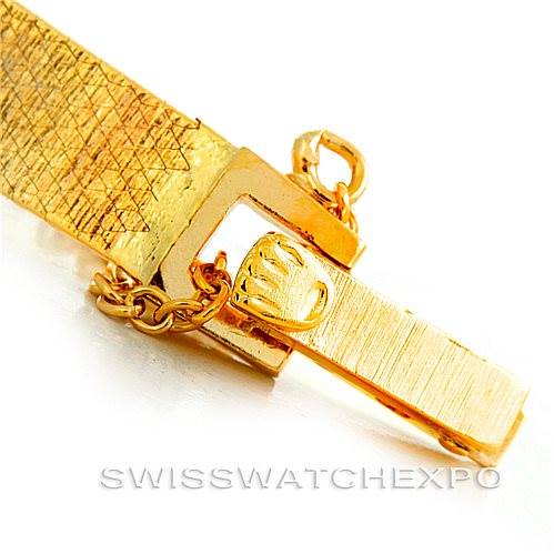 This is a close-up image showing the clasp and bracelet of a Rolex Cocktail 8422 Women's Yellow Gold Champagne Dial 8422 Women's Yellow Gold Champagne Dial model.