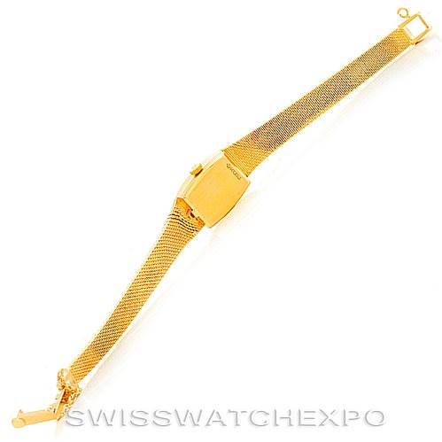 The image shows a Rolex Cocktail 8422 Women's Yellow Gold Champagne Dial 8422 Women's Yellow Gold Champagne Dial model watch, viewed from an angle showcasing the clasp, bracelet, and case back.