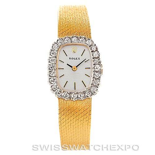 The image shows a frontal view of a Rolex Cocktail Women's Yellow Gold Silver Dial Women's Yellow Gold Silver Dial model watch, highlighting its gold mesh bracelet and diamond bezel.
