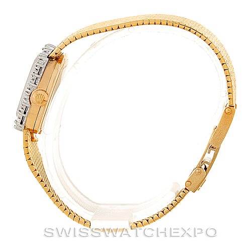 The Rolex Cocktail Women's Yellow Gold Silver Dial Women's Yellow Gold Silver Dial model watch is shown from a side angle, highlighting its bracelet, clasp, and part of the case.