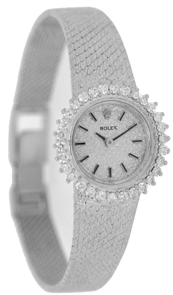 The image shows a Rolex Cocktail 8032 Women's White Gold Silver Dial 8032 Women's White Gold Silver Dial model watch angled slightly to the side, displaying the face, bezel, and part of the bracelet.