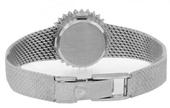 This image shows the back view of the Rolex Cocktail 8032 Women's White Gold Silver Dial 8032 Women's White Gold Silver Dial model watch, highlighting its clasp and bracelet.