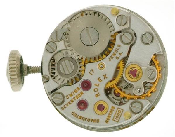 This image shows the internal movement and gears of the Rolex Cocktail 8032 Women's White Gold Silver Dial 8032 Women's White Gold Silver Dial model watch from a top-down angle.