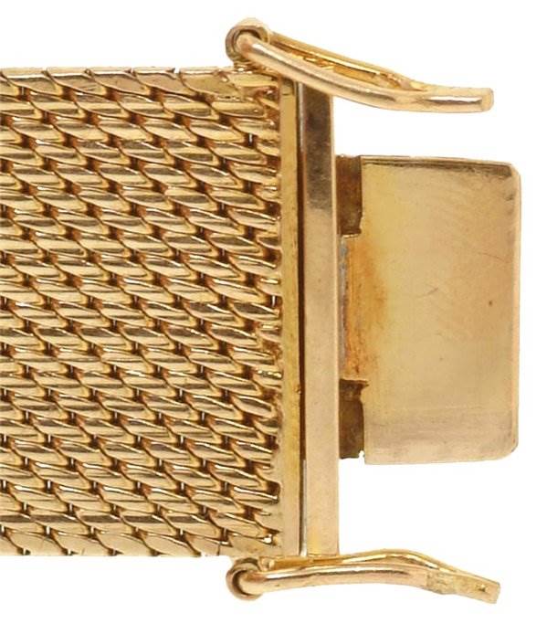This image shows a close-up of the gold mesh band and clasp mechanism of a Rolex Cocktail 2604 Women's Yellow Gold Silver Dial 2604 Women's Yellow Gold Silver Dial model watch.