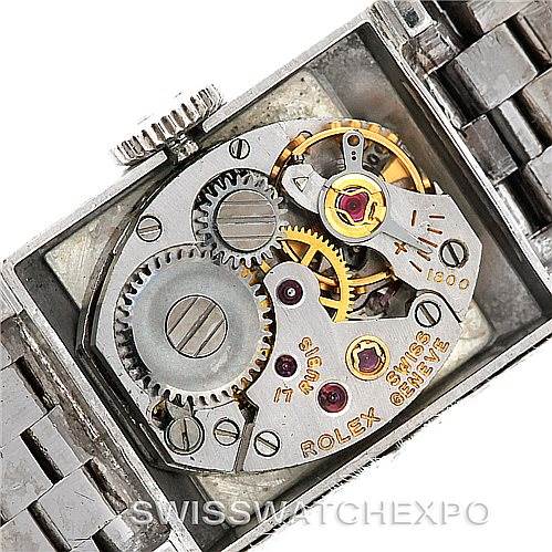 The image shows the internal mechanism with gears and components of the Rolex Cocktail 2159 Women's White Gold Silver Dial 2159 Women's White Gold Silver Dial model, viewed from the back.