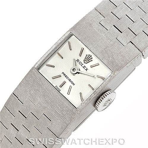 The image shows a top view of the Rolex Cocktail 2159 Women's White Gold Silver Dial 2159 Women's White Gold Silver Dial model watch, highlighting the face, dial, and part of the metal bracelet.